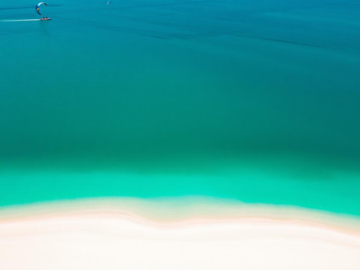 Jet ski in Paje, Zanzibar — aerial view of the lagoon and exposed sandbar